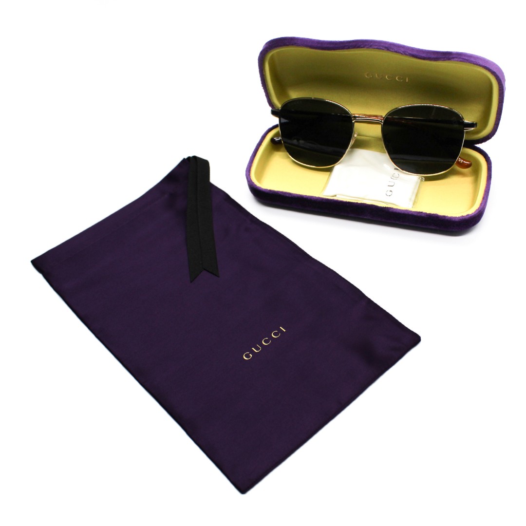 Солнцезащитные очки Gucci GG0575SK