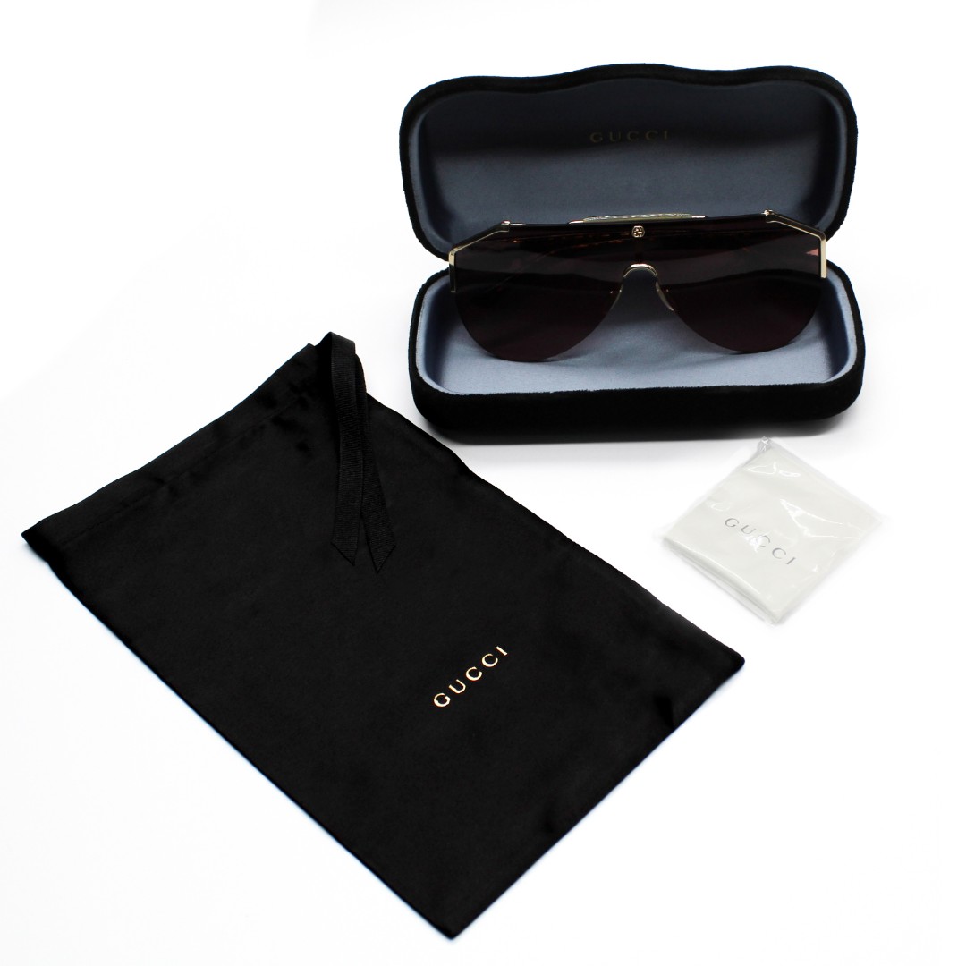 Солнцезащитные очки Gucci GG0584S