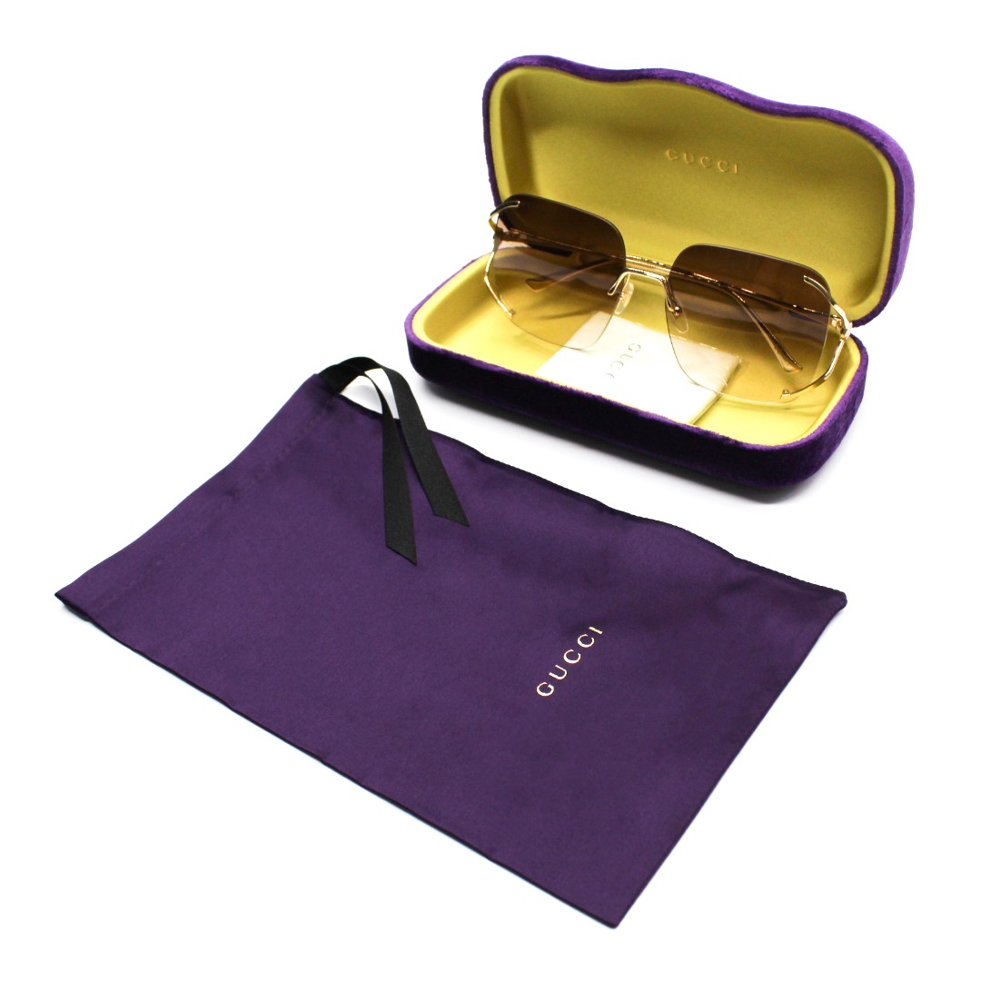 Солнцезащитные очки Gucci GG0646S